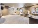 Finished basement with theater seating, projector, and large screen, perfect for entertainment at 4681 S Columbine Ct, Cherry Hills Village, CO 80113