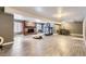 Finished basement with game area, fireplace, and dining table at 4681 S Columbine Ct, Cherry Hills Village, CO 80113