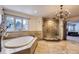 Elegant bathroom with a large soaking tub and a walk-in shower at 4681 S Columbine Ct, Cherry Hills Village, CO 80113