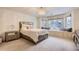 Comfortable bedroom with window seat and built-in storage at 4681 S Columbine Ct, Cherry Hills Village, CO 80113
