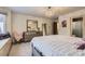 Charming bedroom with window seat and ample closet space at 4681 S Columbine Ct, Cherry Hills Village, CO 80113