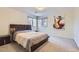 Well-lit bedroom with large window and modern decor at 4681 S Columbine Ct, Cherry Hills Village, CO 80113