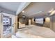 Basement home theater with large screen and comfortable seating at 4681 S Columbine Ct, Cherry Hills Village, CO 80113