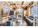 Wood paneled library with built-in shelves and fireplace at 4681 S Columbine Ct, Cherry Hills Village, CO 80113