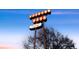Vintage-style Oneida Park sign against a clear sky, evoking a sense of nostalgia and community spirit at 2867 Jasmine St, Denver, CO 80207