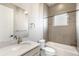 Modern bathroom with soaking tub, shower, and updated vanity at 1694 Quitman St, Denver, CO 80204