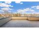 Private deck overlooking a lake and city views at 1694 Quitman St, Denver, CO 80204