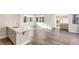 Modern kitchen with quartz countertops and gray cabinetry at 1694 Quitman St, Denver, CO 80204