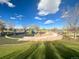 Modern playground with play structures, and a soft surface at 1694 Quitman St, Denver, CO 80204