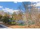 View of tennis courts and a lake from a balcony at 1694 Quitman St, Denver, CO 80204