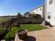 Well-maintained backyard with deck, lawn, and wooden fence at 7982 S Kittredge Way, Englewood, CO 80112