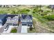 Aerial view of a house with solar panels, showcasing the surrounding landscape and neighborhood at 4585 High Mesa Cir, Castle Rock, CO 80108
