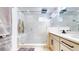 Bathroom showcasing a glass shower with marble tile and built-in bench at 4585 High Mesa Cir, Castle Rock, CO 80108