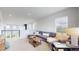 Upstairs living room showcases a sectional sofa, rustic wood accents, and an open layout at 4585 High Mesa Cir, Castle Rock, CO 80108