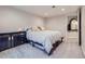 Bedroom with neutral walls and plush carpeting plus a large dresser for storage at 3341 Oneida St, Denver, CO 80207