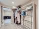 Walk-in closet with metal shelving for easy storage and organization in a home at 3341 Oneida St, Denver, CO 80207