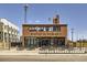 Charming Station 26 Brewing with outdoor seating and visible signage at 3341 Oneida St, Denver, CO 80207
