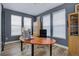 Well-lit office space with a large desk and modern decor at 6610 Barnstead Dr, Castle Pines, CO 80108