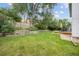 Large backyard with a deck, garden, and plenty of space to enjoy outdoor living at 3308 W 11Th Avenue Pl, Broomfield, CO 80020