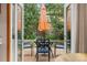 Outdoor dining set on backyard deck, perfect for outdoor dining and relaxing in a private setting at 3308 W 11Th Avenue Pl, Broomfield, CO 80020