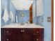 Charming bathroom features a vanity with marble countertop and decorative hardware at 3308 W 11Th Avenue Pl, Broomfield, CO 80020