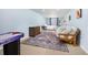 Finished basement offers flexible living with a bedroom area, games, and a lounge area at 3308 W 11Th Avenue Pl, Broomfield, CO 80020
