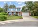 Charming two-story home featuring a well-manicured front lawn, brick accents, and an attached two-car garage at 3308 W 11Th Avenue Pl, Broomfield, CO 80020