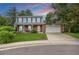 Charming two-story home featuring a well-manicured front lawn, brick accents, and an attached two-car garage at 3308 W 11Th Avenue Pl, Broomfield, CO 80020