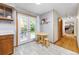 Cozy kitchen with a dining area and door leading to backyard deck, creating a seamless indoor-outdoor transition at 3308 W 11Th Avenue Pl, Broomfield, CO 80020