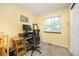 Bright office space features a large window, desk and storage at 3308 W 11Th Avenue Pl, Broomfield, CO 80020
