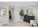 Serene bedroom featuring neutral tones, modern furnishings, and a glimpse into hallway at 17164 W 91St Ln, Arvada, CO 80007