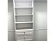 Organized closet with built-in shelving and drawers at 11282 Osage N Cir # F, Northglenn, CO 80234