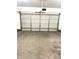 Spacious two-car garage featuring a clean concrete floor and an automatic door opener at 11282 Osage N Cir # F, Northglenn, CO 80234