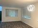 Bright and airy living room with hardwood floors and modern lighting at 11282 Osage N Cir # F, Northglenn, CO 80234