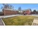 Spacious backyard with patio, shed and grassy area at 1947 E 117Th Way, Northglenn, CO 80233