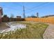 Backyard with grassy area and wood fence at 1947 E 117Th Way, Northglenn, CO 80233