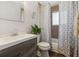 Clean bathroom with a shower/tub combo and updated vanity at 1947 E 117Th Way, Northglenn, CO 80233