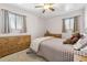 Bright bedroom with a comfortable bed and ample closet space at 1947 E 117Th Way, Northglenn, CO 80233