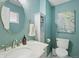 Fresh bathroom with marble vanity, stylish mirror, and modern fixtures at 9325 Utica St, Westminster, CO 80031
