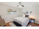 Cozy bedroom featuring ample natural light and minimalist décor at 9325 Utica St, Westminster, CO 80031