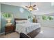 Spacious bedroom with vaulted ceiling, skylight, and large windows offering natural light at 9325 Utica St, Westminster, CO 80031