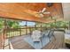 Inviting covered deck offering outdoor living and scenic golf course views at 9325 Utica St, Westminster, CO 80031