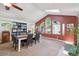 Bright dining room with a skylight, vaulted ceiling, and large windows at 9325 Utica St, Westminster, CO 80031