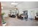 Spacious living room features vaulted ceilings, lots of natural light, and a dining area at 9325 Utica St, Westminster, CO 80031