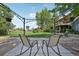 Cozy patio area featuring comfortable seating, potted plants, and scenic backyard views perfect for relaxing outdoors at 9325 Utica St, Westminster, CO 80031