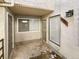 Private entryway with exterior door and storage closet at 1825 Kendall St # 215, Lakewood, CO 80214