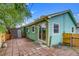 Backyard of house with patio and sliding glass doors at 999 Osceola St, Denver, CO 80204