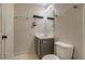 Bathroom featuring single sink, light fixture, and towel racks at 999 Osceola St, Denver, CO 80204