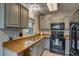 Well-lit kitchen featuring updated cabinets, modern appliances, and functional layout at 999 Osceola St, Denver, CO 80204