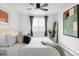 Bright bedroom featuring a ceiling fan, natural light, and modern decor for a clean, relaxing space at 1 N Pearl St # 201, Denver, CO 80203